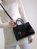 Sac De Jour black patent leather handbag