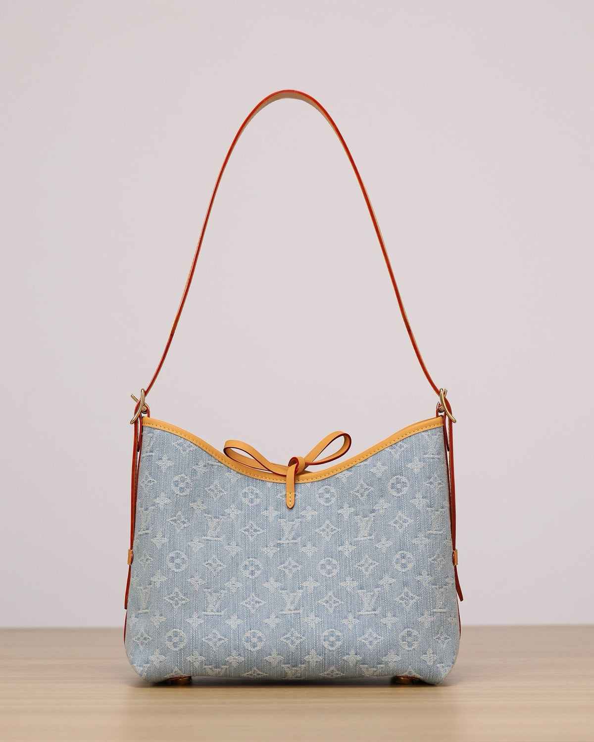 2026 CarryAll PM Handbag, Blue Monogram Denim M11462